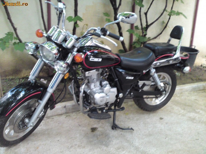 motocicleta CSR-125 cm3 foto mare