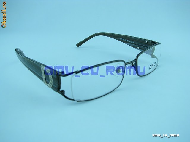 RAME OCHELARI VEDERE: D&amp;G ARMANI GUCCI HUGO BOSS PRADA foto mare
